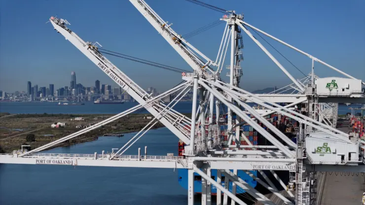 In an aerial view, shipping cranes made by Chinese owned manufacturer Zhenhua Heavy Industries Company (ZPMC) stand at the Port of Oakland on March 08, 2024 in Oakland, California.